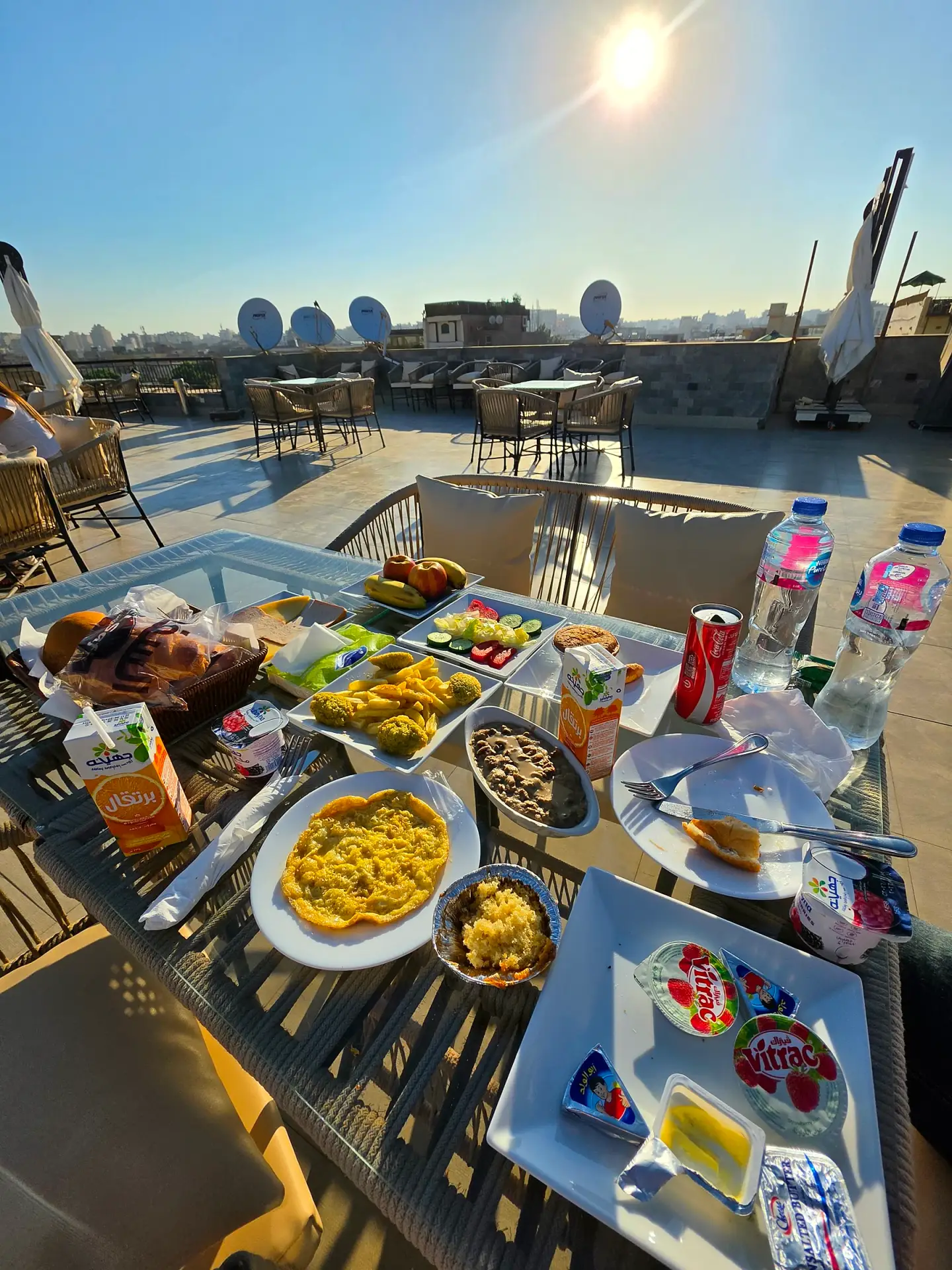 Rooftop breakfast with the Pyramids of Giza in the background